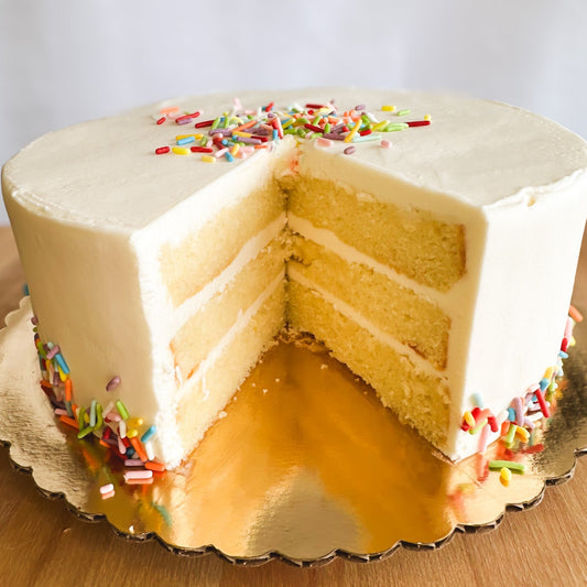 Vanilla cake, vanilla buttercream, sprinkles. Makes a great birthday cake.